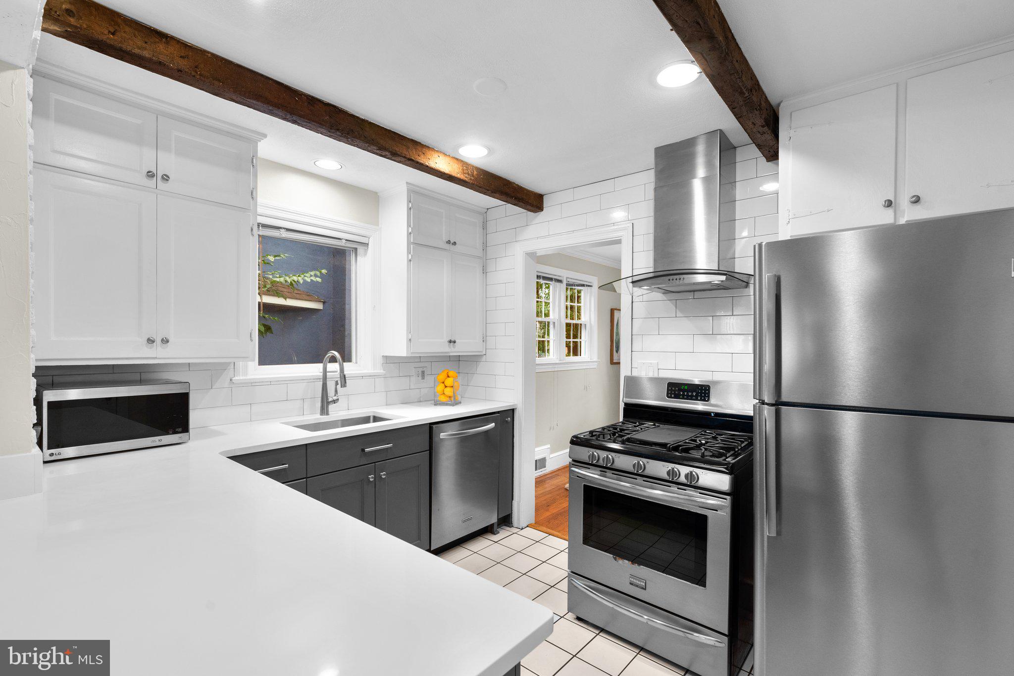 807 Islington Street Silver Spring, MD 20910 - Photo 15 of 49 Renovated Kitchen with stainless steel appliances