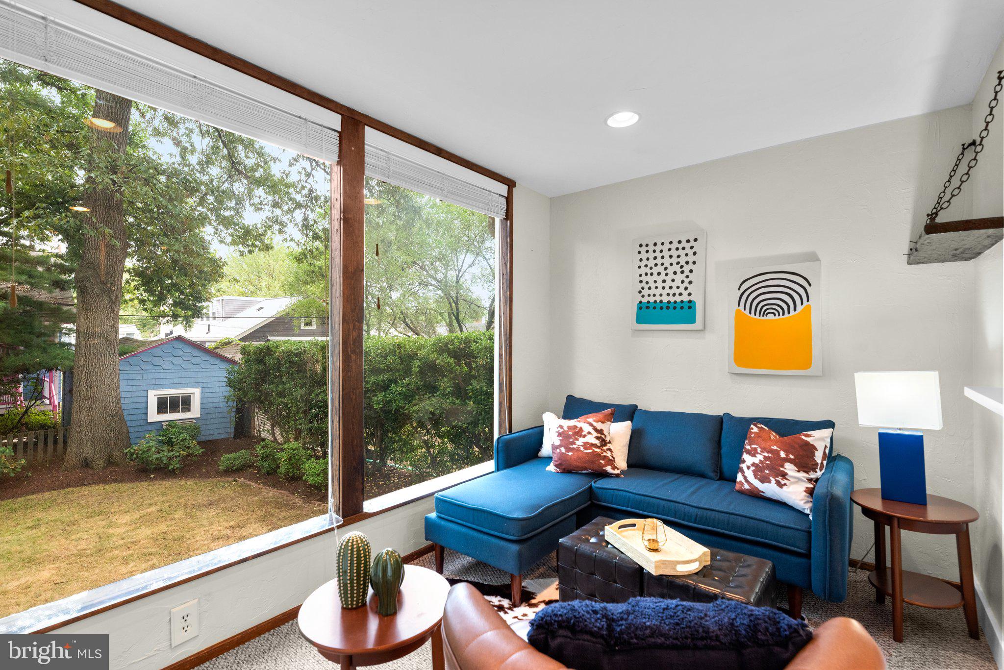 807 Islington Street Silver Spring, MD 20910 - Photo 18 of 49 Family Room with large picture windows of backyard