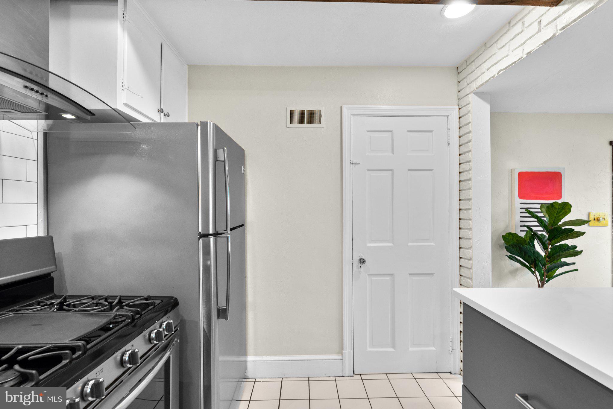 807 Islington Street Silver Spring, MD 20910 - Photo 22 of 49 Basement Door in the Kitchen