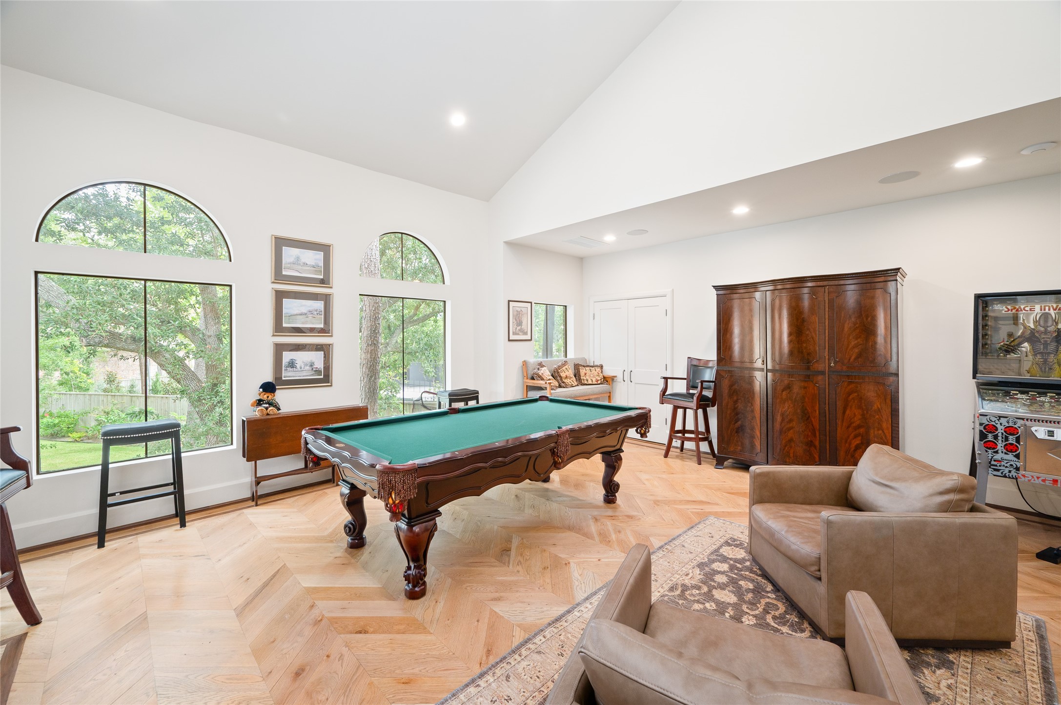 11518 Shadow Way Street Houston, TX 77024 - Photo 41 of 50 Filled with natural light from two expansive windows and framed by double sliding glass doors, the bonus room is ideal for game nights, hangouts, or creative studio use.
