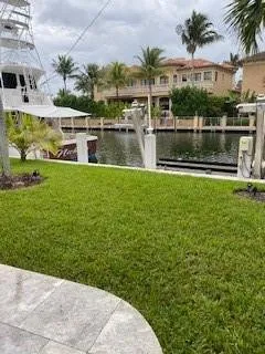 a view of a garden with a lake view