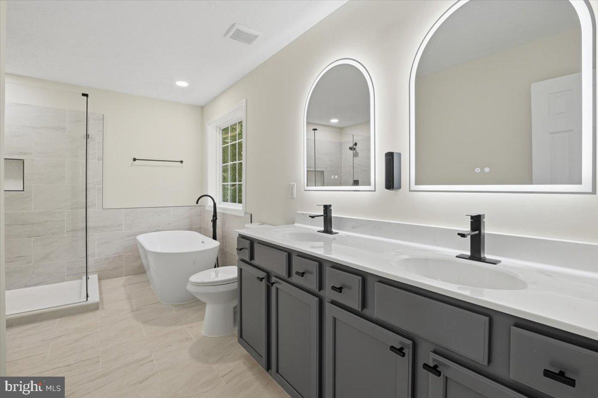 242 Cedar Ridge Drive Ruther Glen, VA 22546 - Photo 18 of 48 Master bathroom