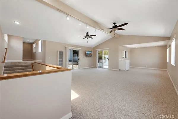 a view of a livingroom with a staircase