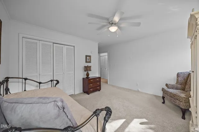 a view of room with furniture and a window