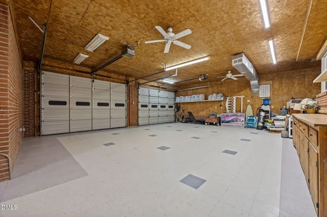 a view of hallway with bathroom