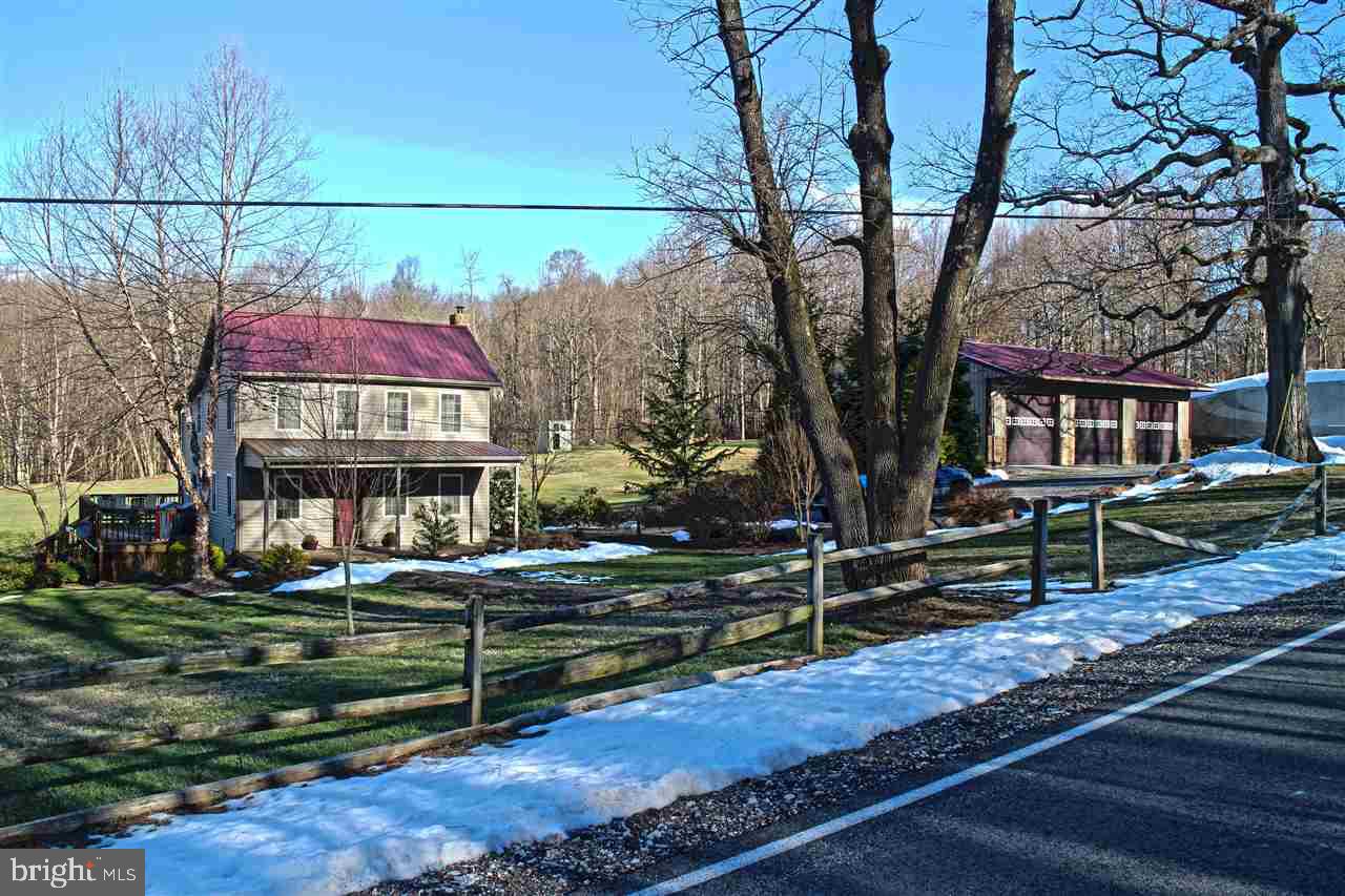 865 Bremer Road Dover, PA 17315 - Photo 1 of 33 a front view of a house with a yard