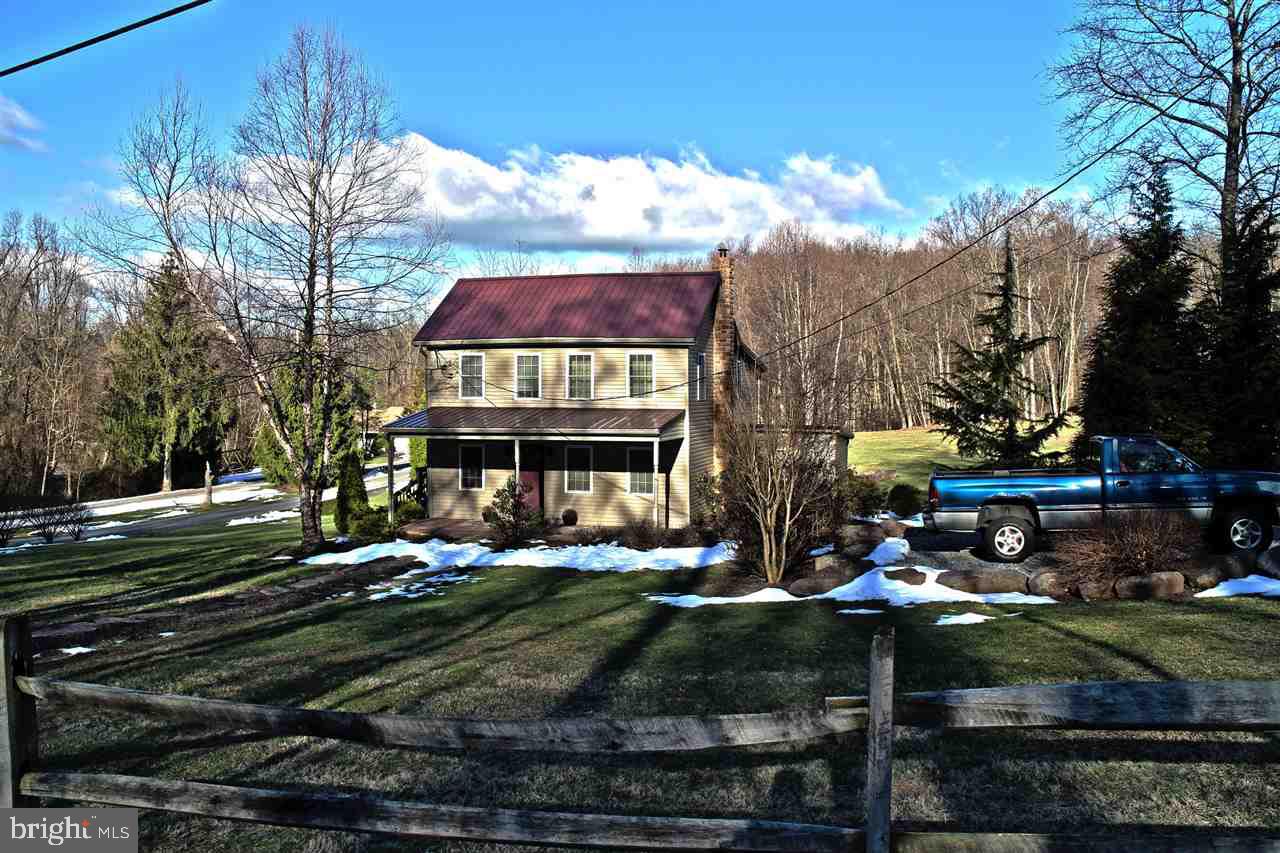 865 Bremer Road Dover, PA 17315 - Photo 2 of 33 a front view of a house with a yard