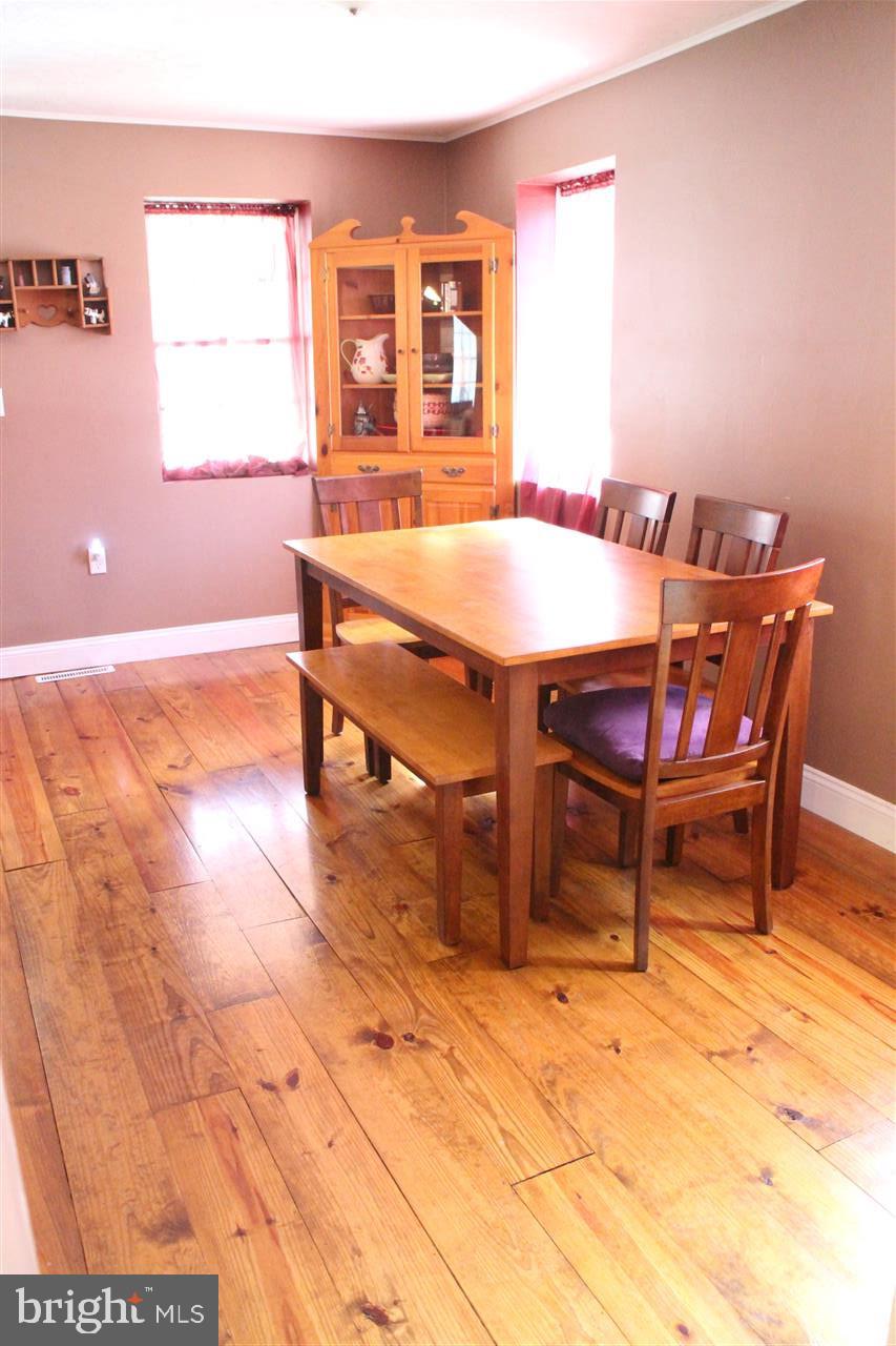 865 Bremer Road Dover, PA 17315 - Photo 11 of 33 a dining room with a table and chairs