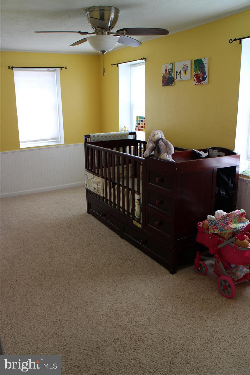 865 Bremer Road Dover, PA 17315 - Photo 17 of 33 a bedroom with a bed and window