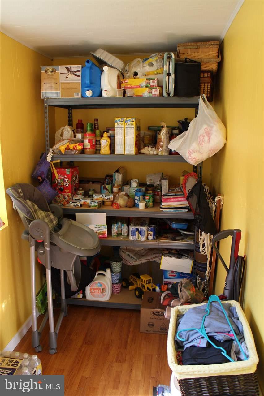 865 Bremer Road Dover, PA 17315 - Photo 21 of 33 a room with lots of different colored cloths