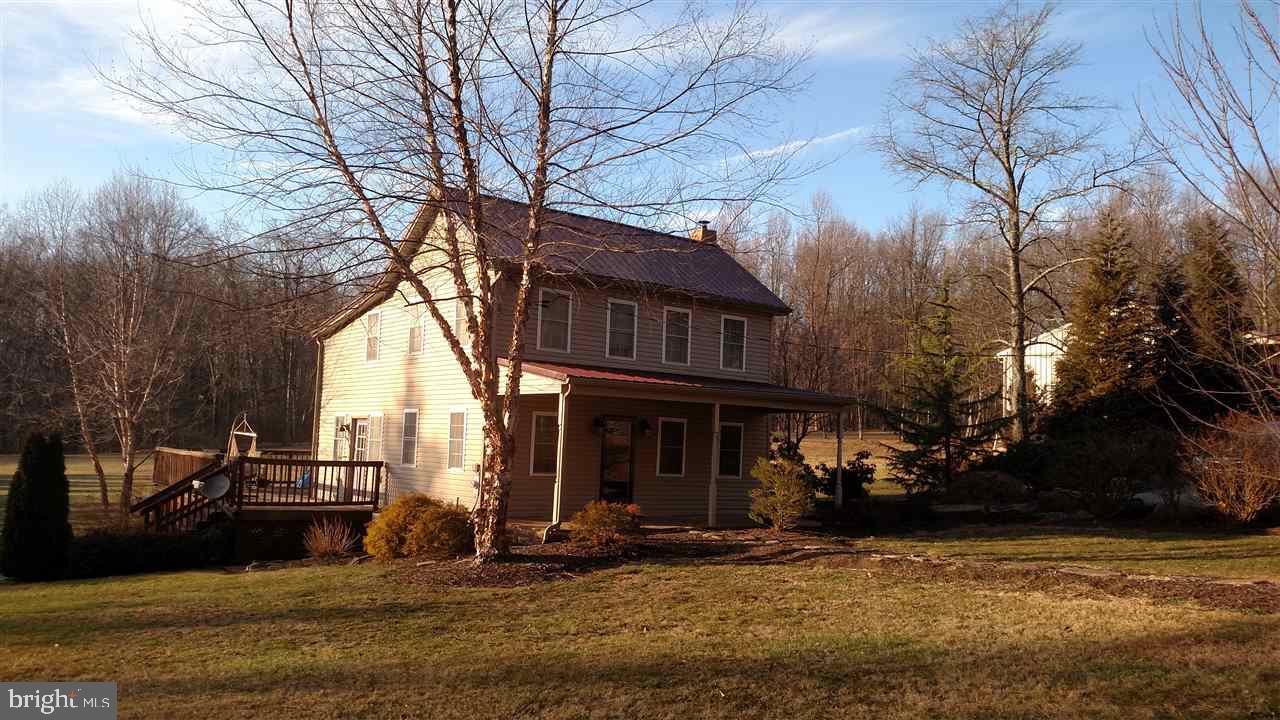 865 Bremer Road Dover, PA 17315 - Photo 32 of 33 a front view of a house with a yard