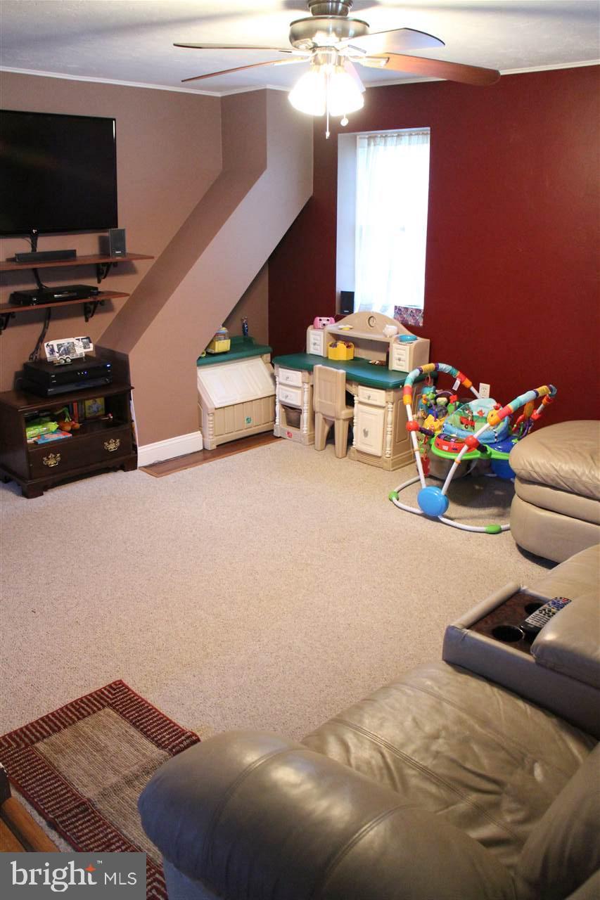 865 Bremer Road Dover, PA 17315 - Photo 6 of 33 a bedroom with a bed and a flat screen tv