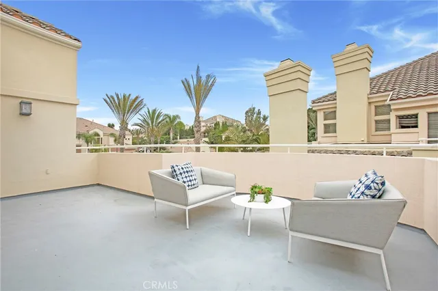 a kitchen with a table and chairs