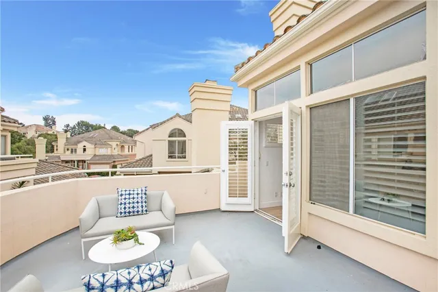 an empty room with a ceiling fan and a window