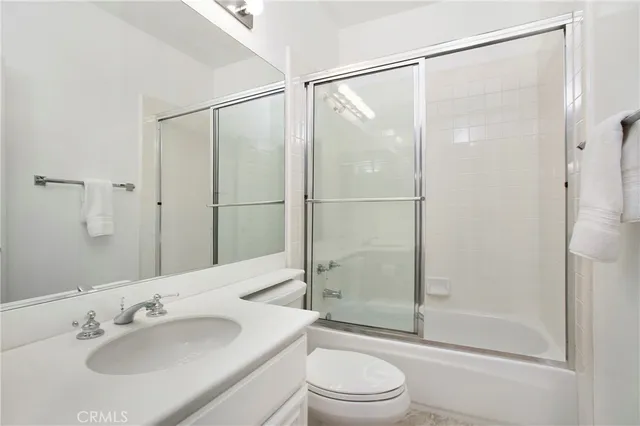 a view of a dining room with furniture and window