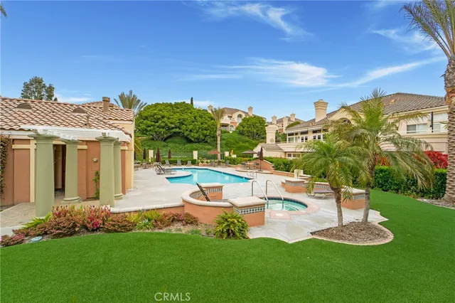 a view of a garden with palm trees