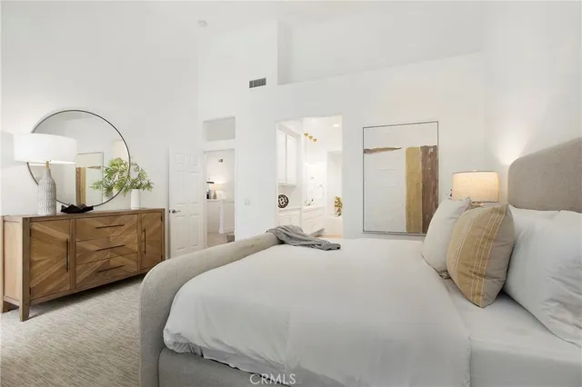 a bathroom with a double vanity sink mirror double and bathtub