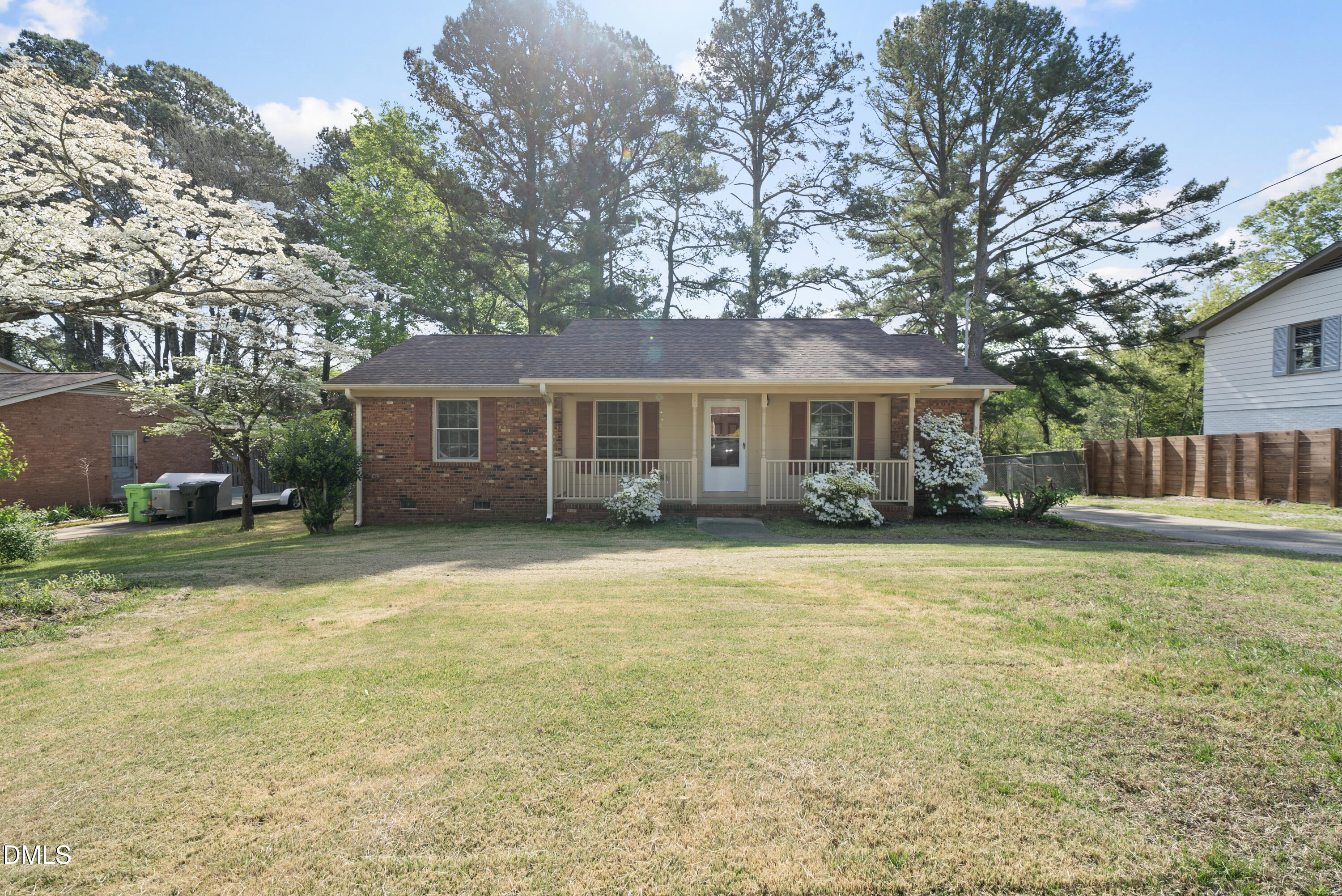 2123 Shenandoah Road Raleigh, NC 27603 - Photo 2 of 26 a front view of a house with a garden