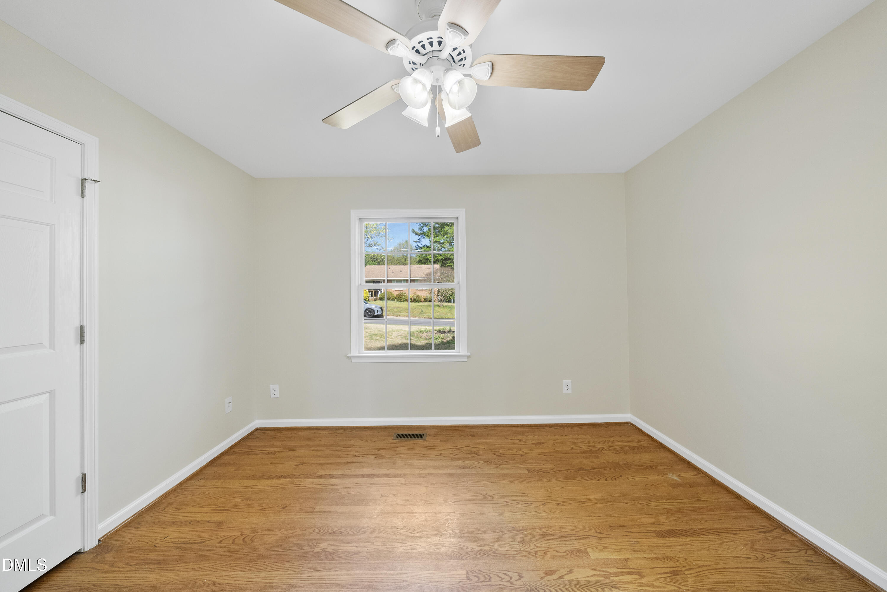 2123 Shenandoah Road Raleigh, NC 27603 - Photo 23 of 26 wooden floor in an empty room with a window