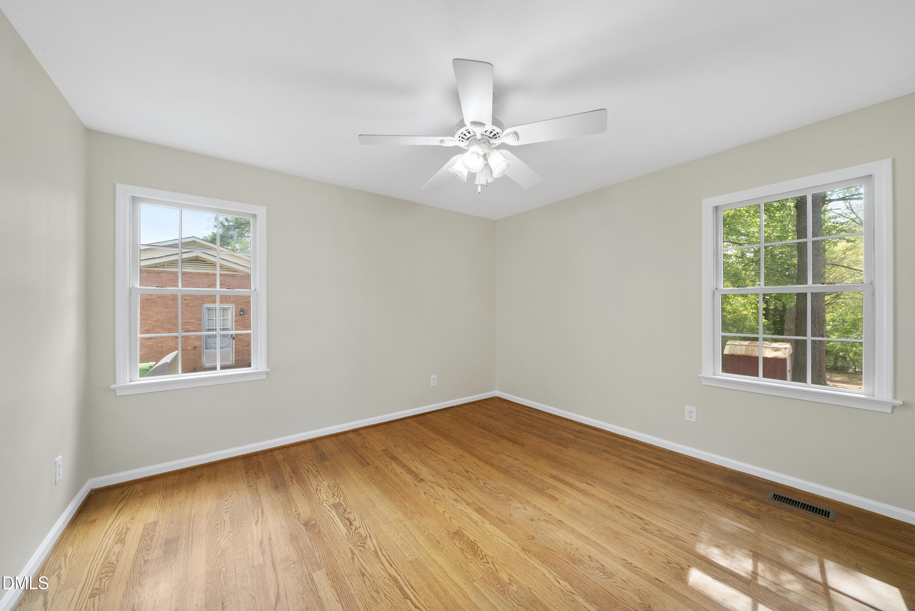 2123 Shenandoah Road Raleigh, NC 27603 - Photo 24 of 26 wooden floor in an empty room with a window