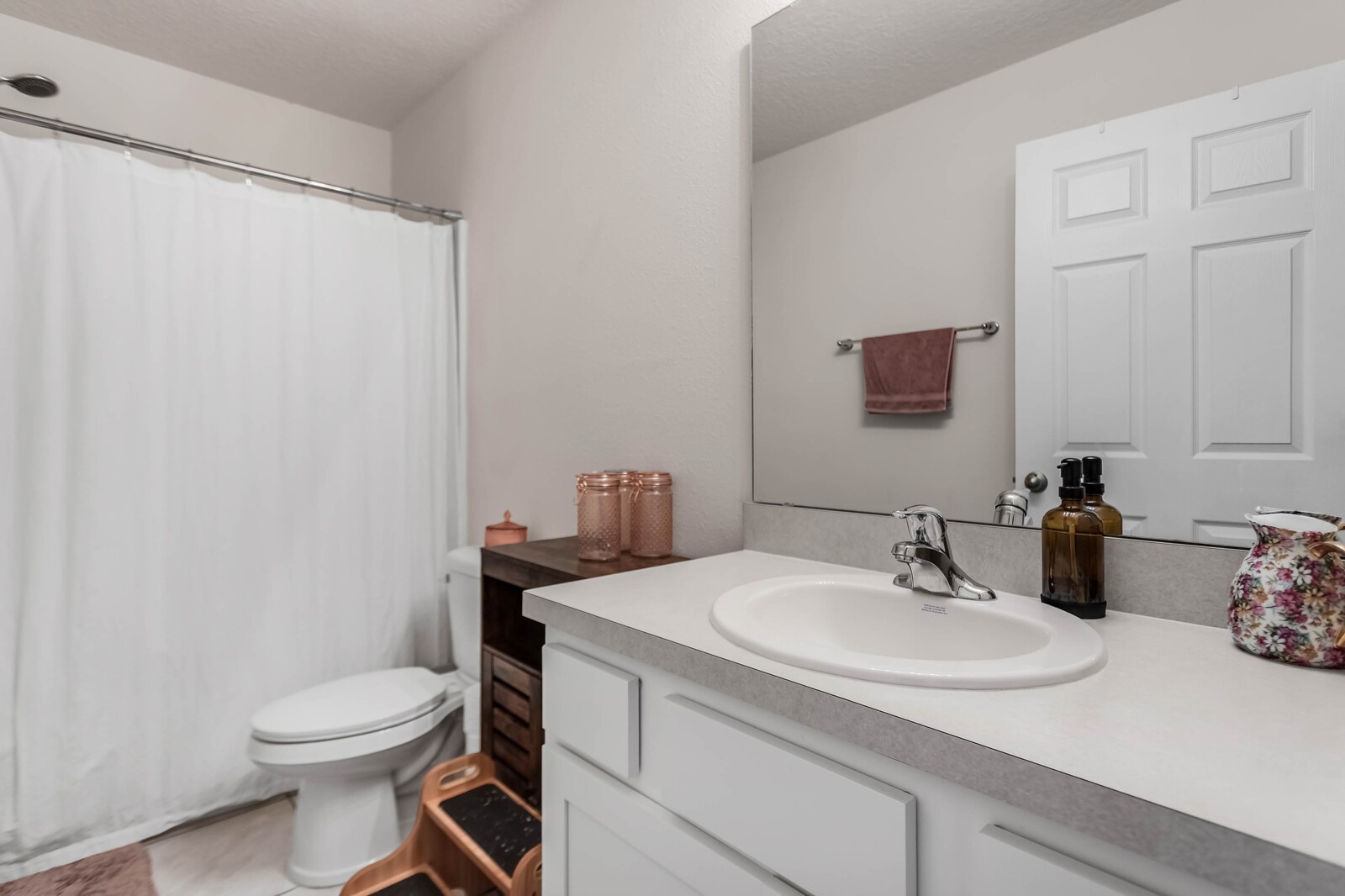86784 Mainline Road Yulee, FL 32097 - Photo 15 of 25 a bathroom with a sink toilet and a mirror