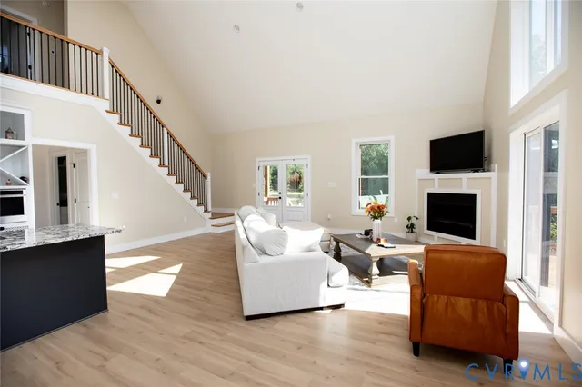 a bedroom with a bed and a lamp