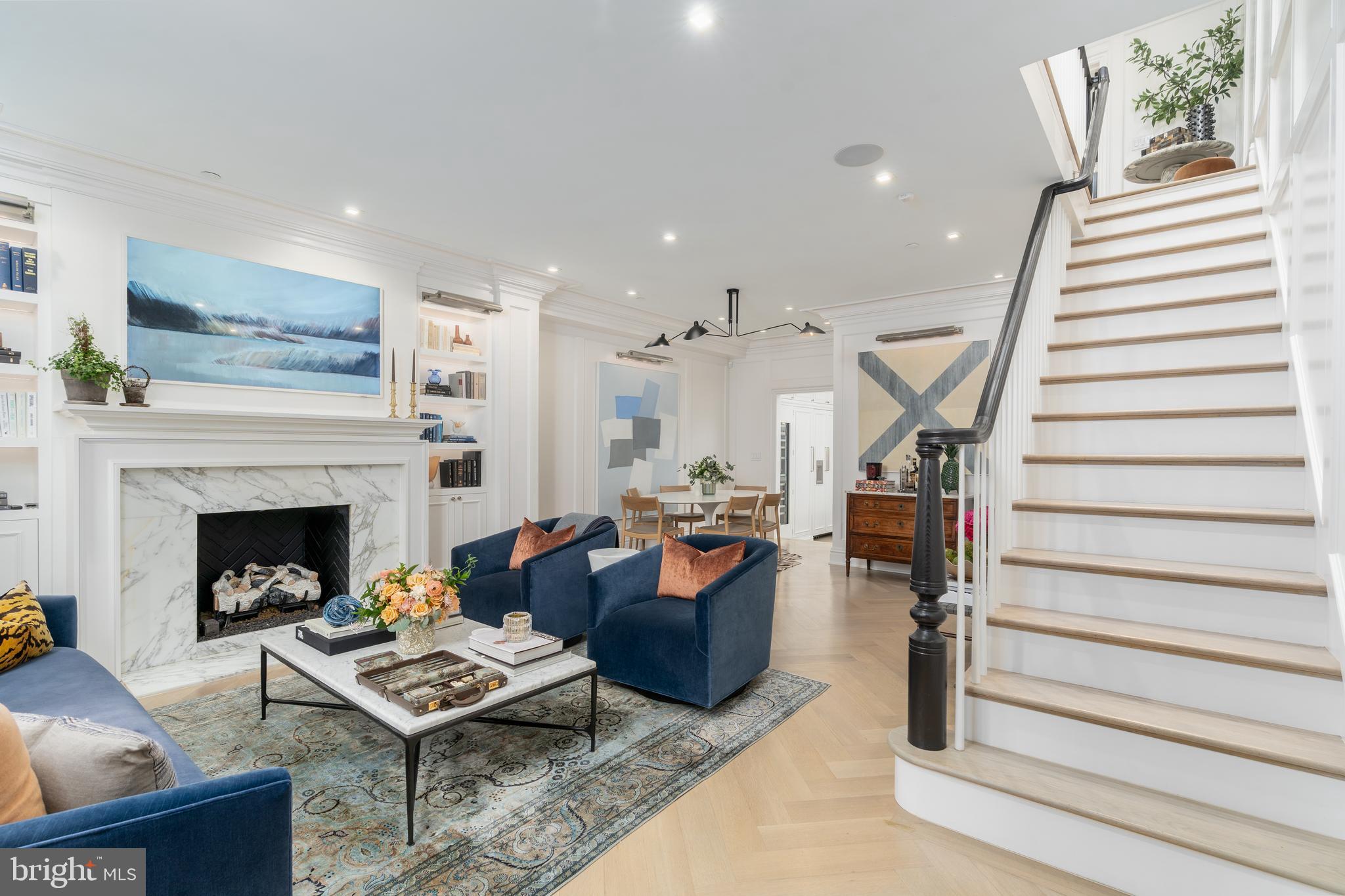 1639 35th Street Northwest Washington, DC 20007 - Photo 15 of 60 a living room with furniture and a fireplace