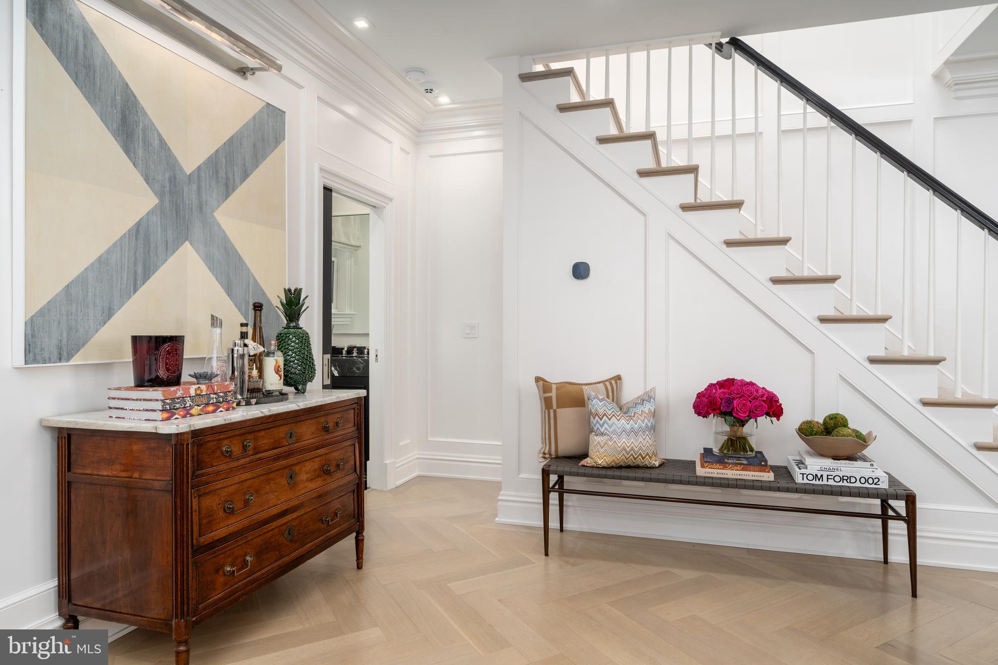 1639 35th Street Northwest Washington, DC 20007 - Photo 17 of 60 a living room with furniture and a potted plant