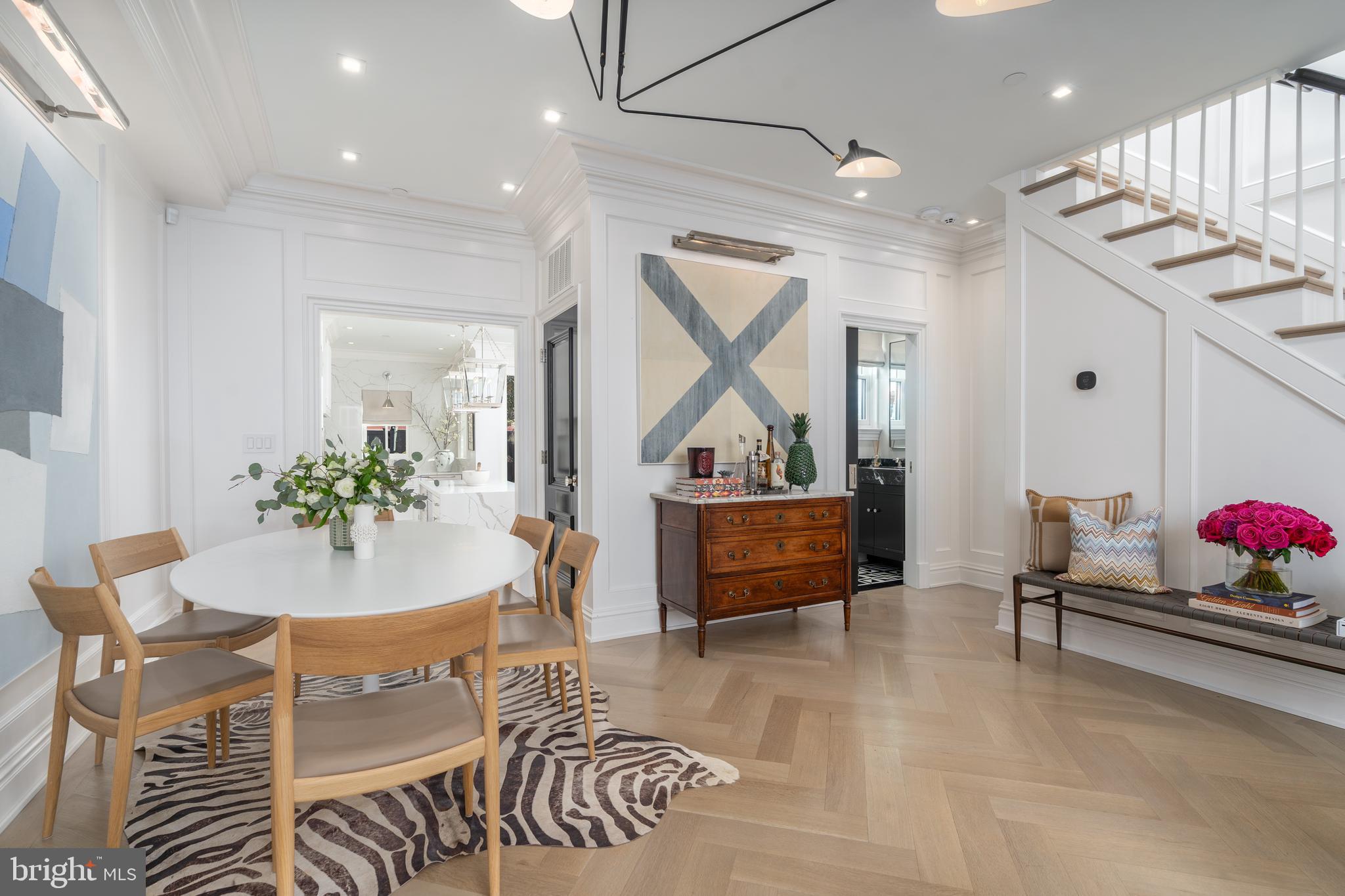 1639 35th Street Northwest Washington, DC 20007 - Photo 3 of 60 a view of a dining room with furniture and a chandelier