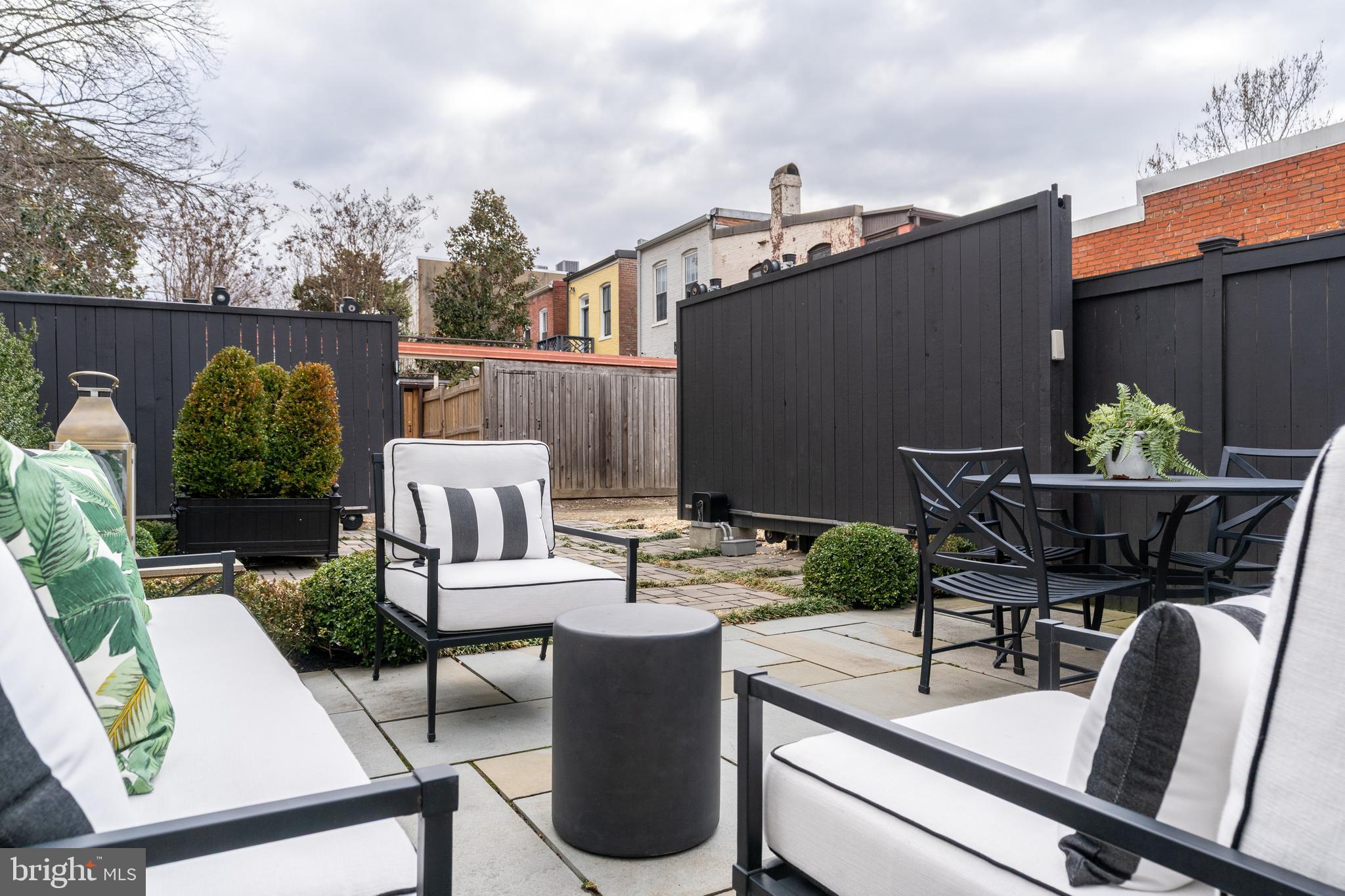 1639 35th Street Northwest Washington, DC 20007 - Photo 55 of 60 a view of a chairs and table in the terrace