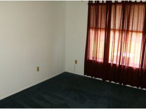 1354 Ne Port Palm Bay, FL 32905 - Photo 6 of 7 an empty room with windows