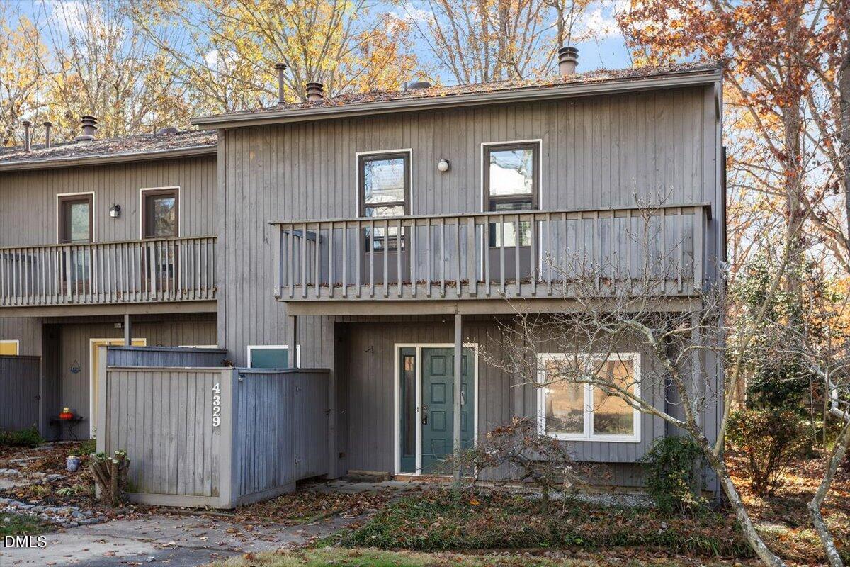 4329 Southwind Drive Raleigh, NC 27613 - Photo 10 of 30 a front view of a house with balcony