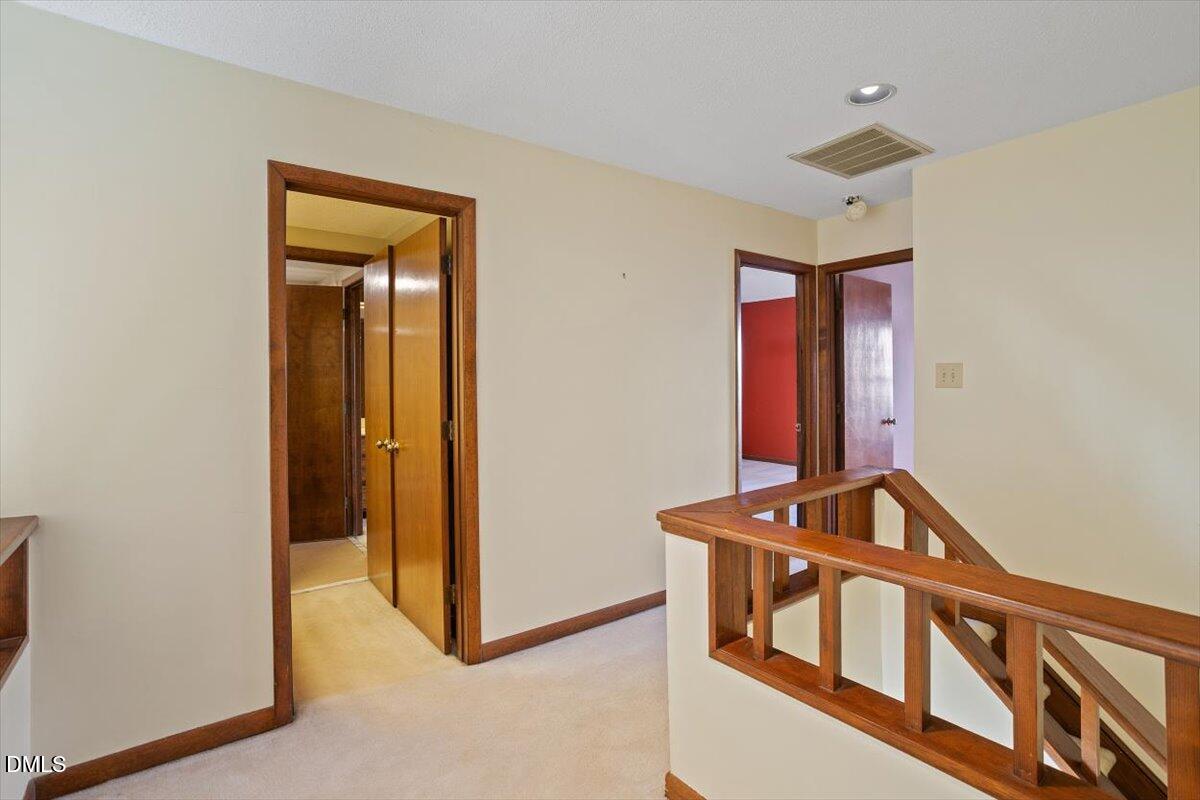 4329 Southwind Drive Raleigh, NC 27613 - Photo 21 of 30 a view of an entryway with hallway