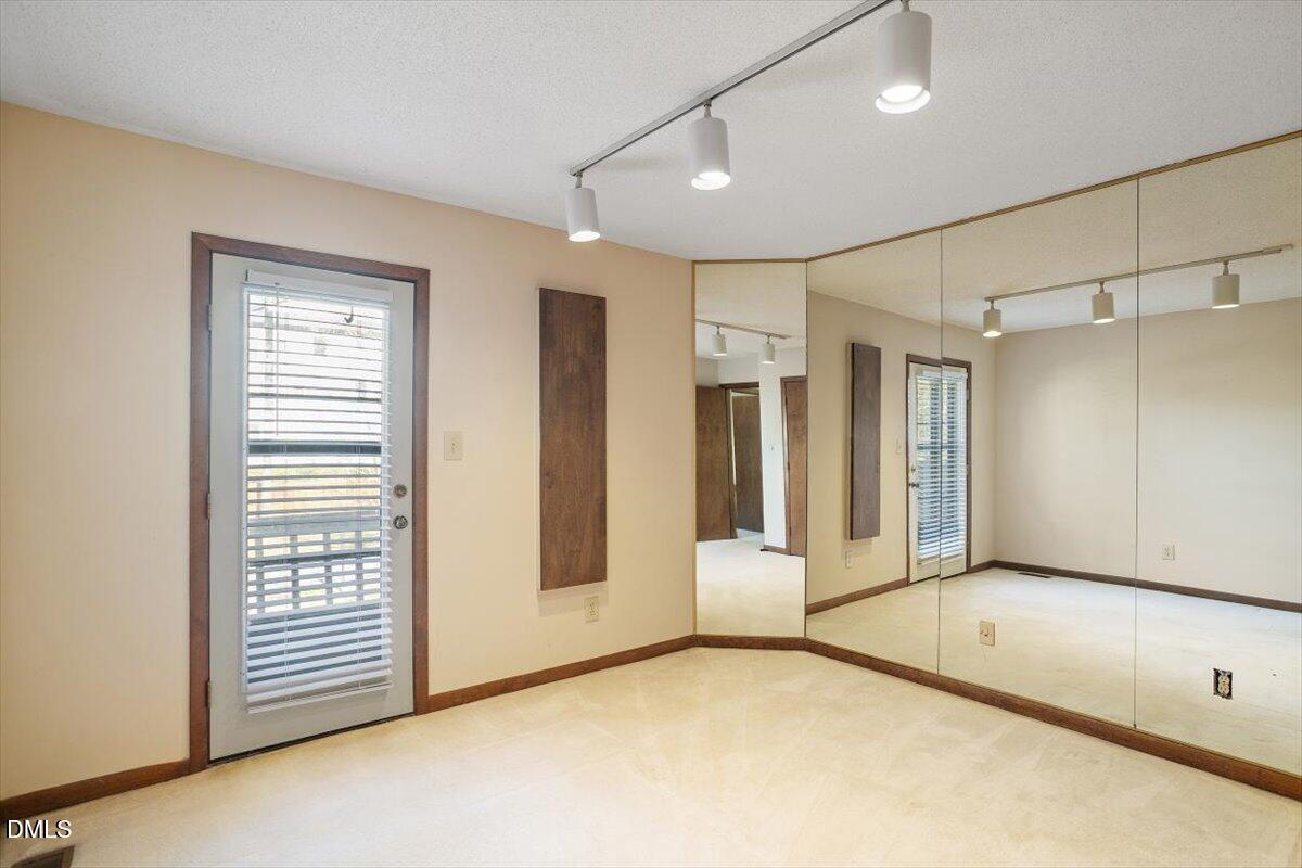 4329 Southwind Drive Raleigh, NC 27613 - Photo 26 of 30 a view of an empty room with a window