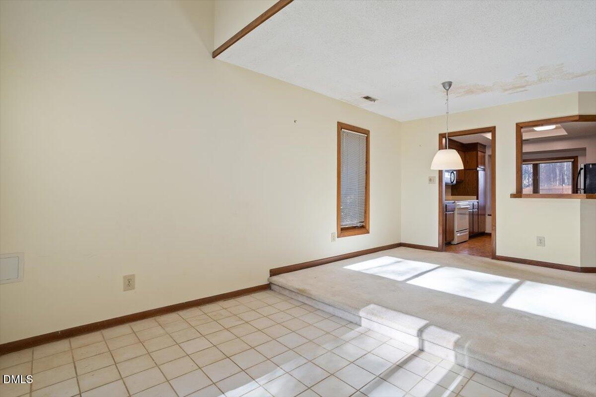 4329 Southwind Drive Raleigh, NC 27613 - Photo 5 of 30 a view of an empty room