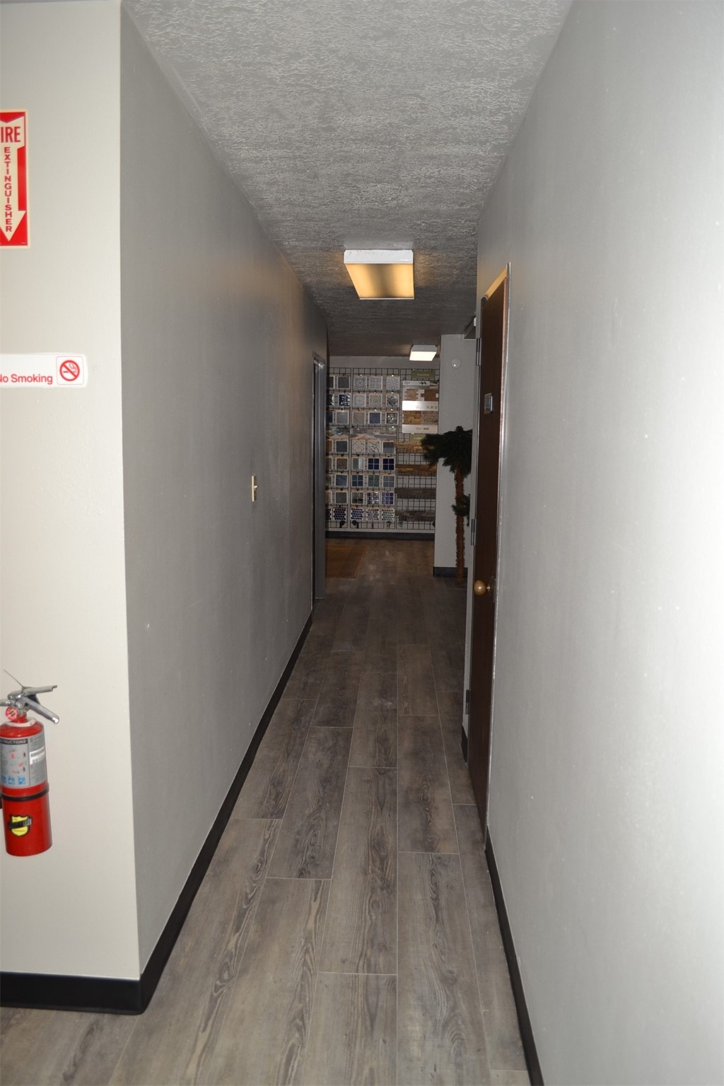 12122 Knigge Cemetery Road Cypress, TX 77429 - Photo 14 of 48 a view of a hallway with wooden floor