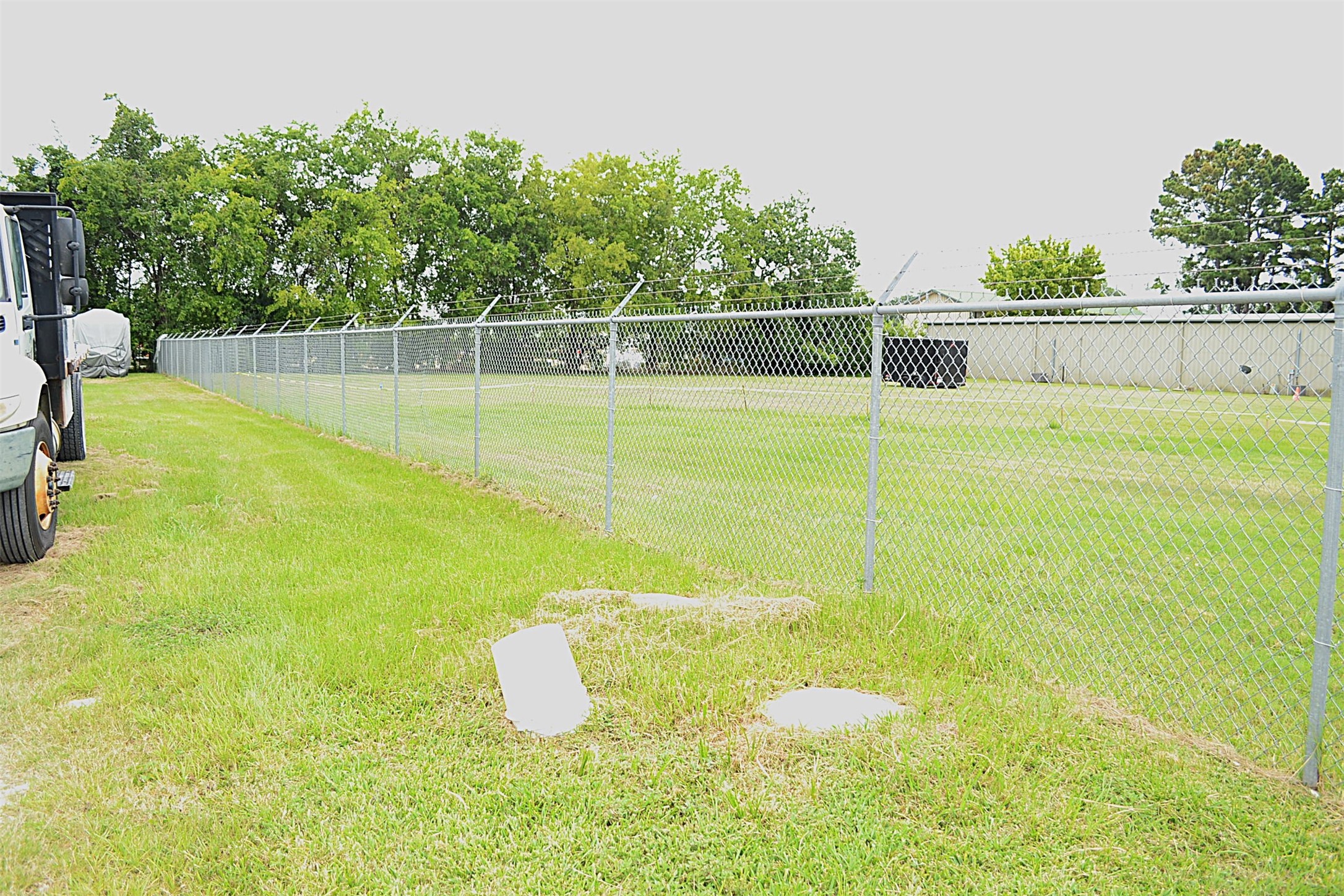 12122 Knigge Cemetery Road Cypress, TX 77429 - Photo 37 of 48 a view of a swimming pool with an outdoor space and seating area