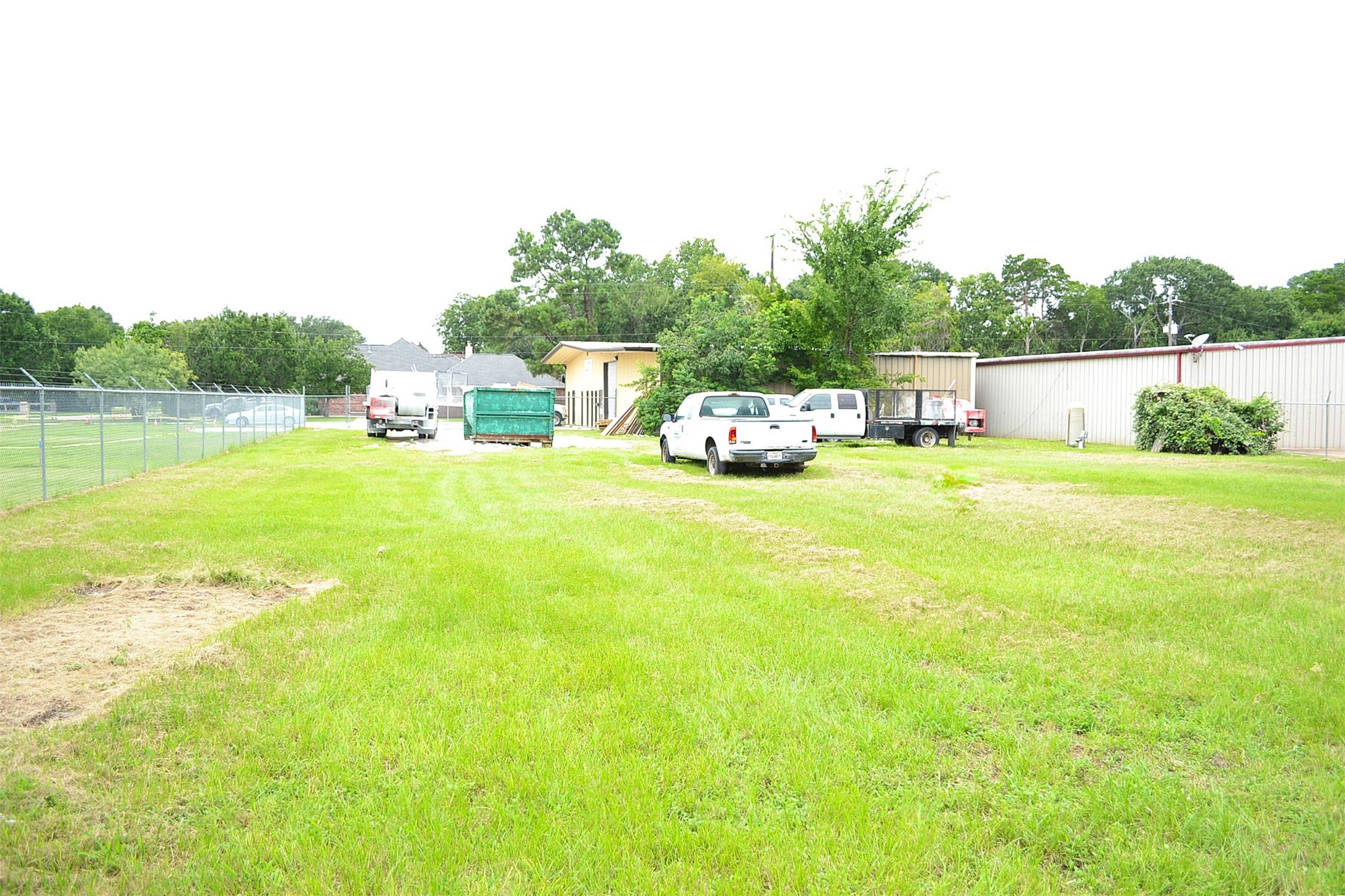 12122 Knigge Cemetery Road Cypress, TX 77429 - Photo 40 of 48 a view of a house with yard and lake view