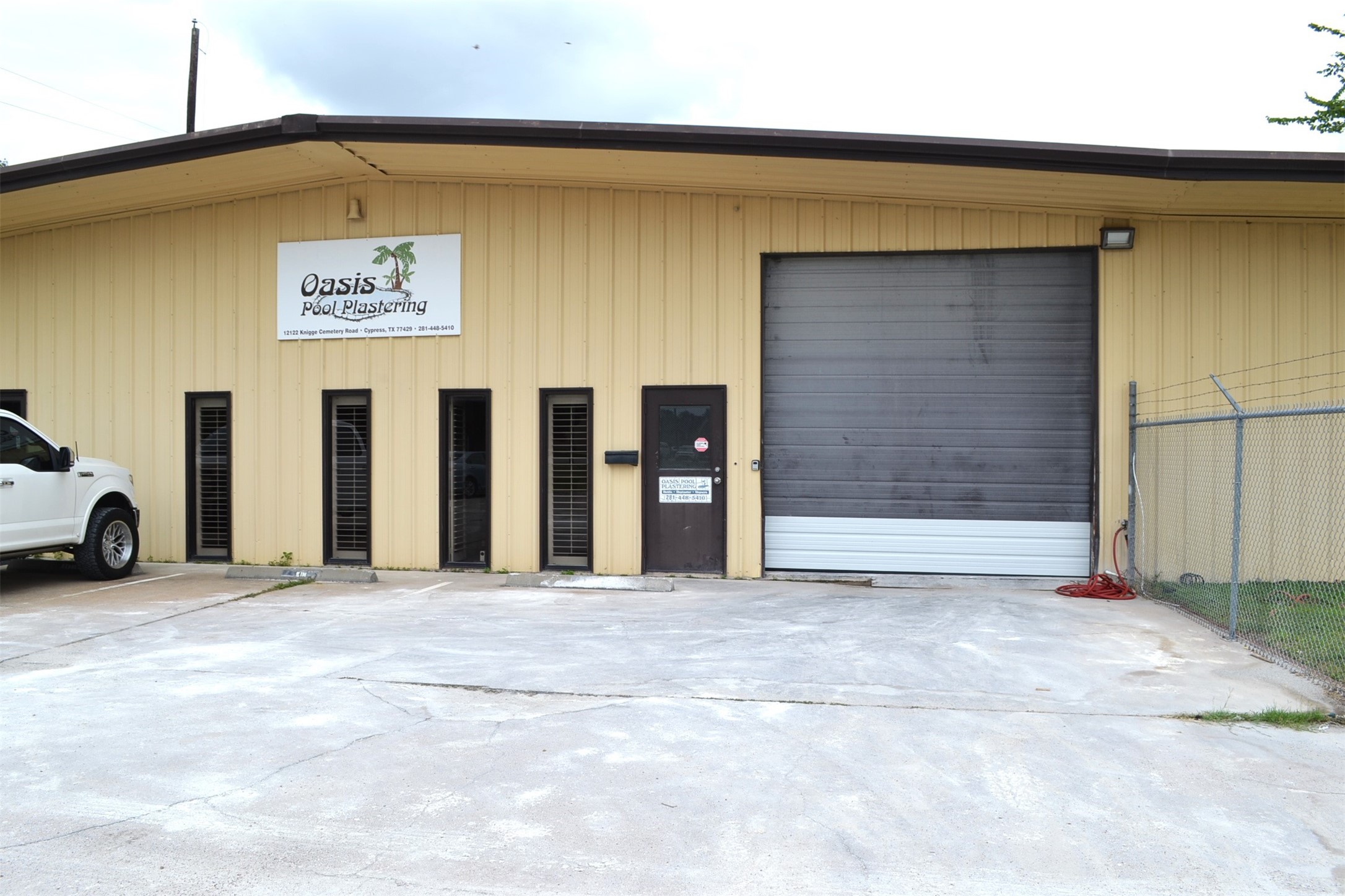 12122 Knigge Cemetery Road Cypress, TX 77429 - Photo 4 of 48 a view of a car garage door