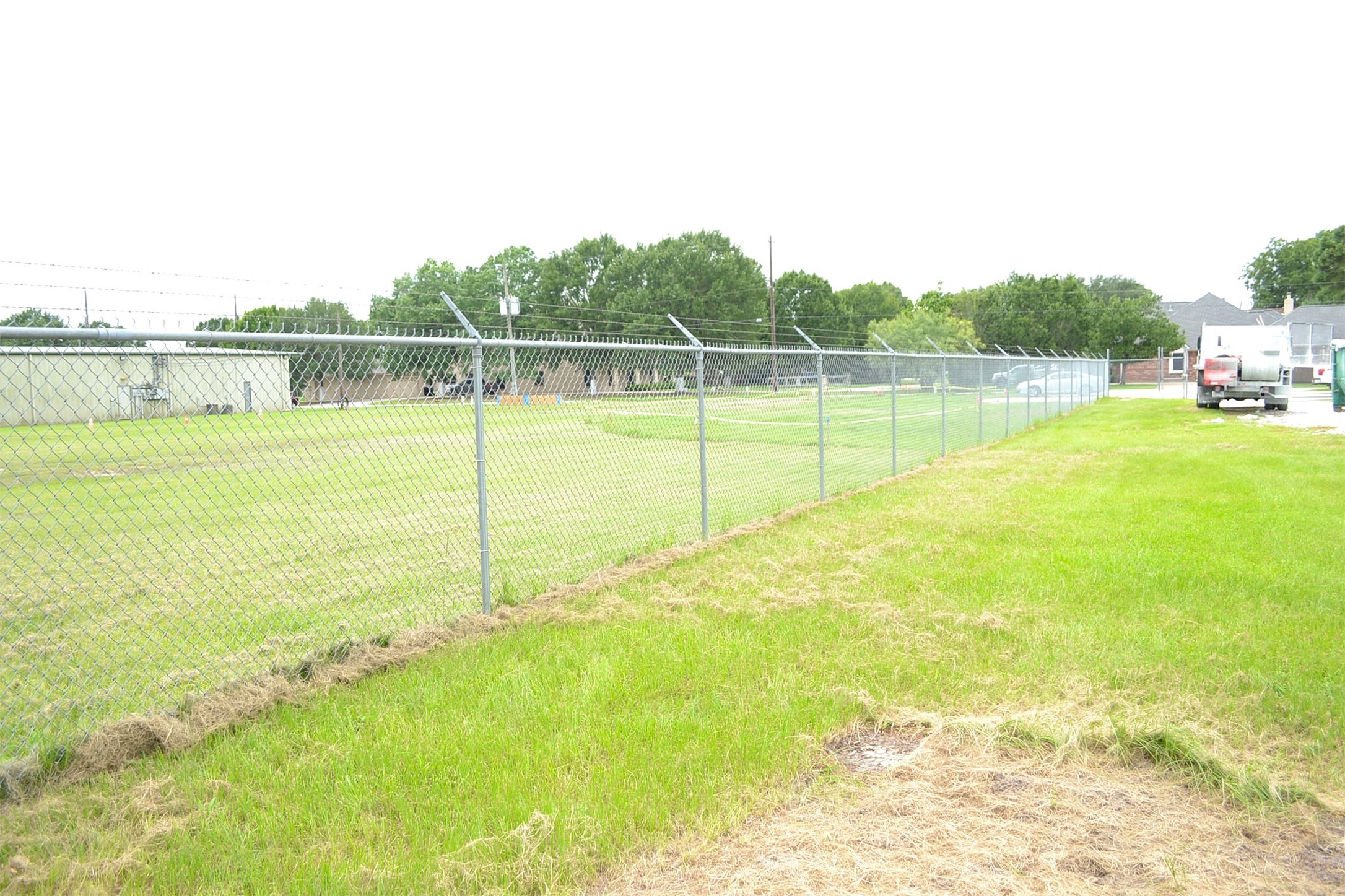 12122 Knigge Cemetery Road Cypress, TX 77429 - Photo 41 of 48 a view of a swimming pool with a yard
