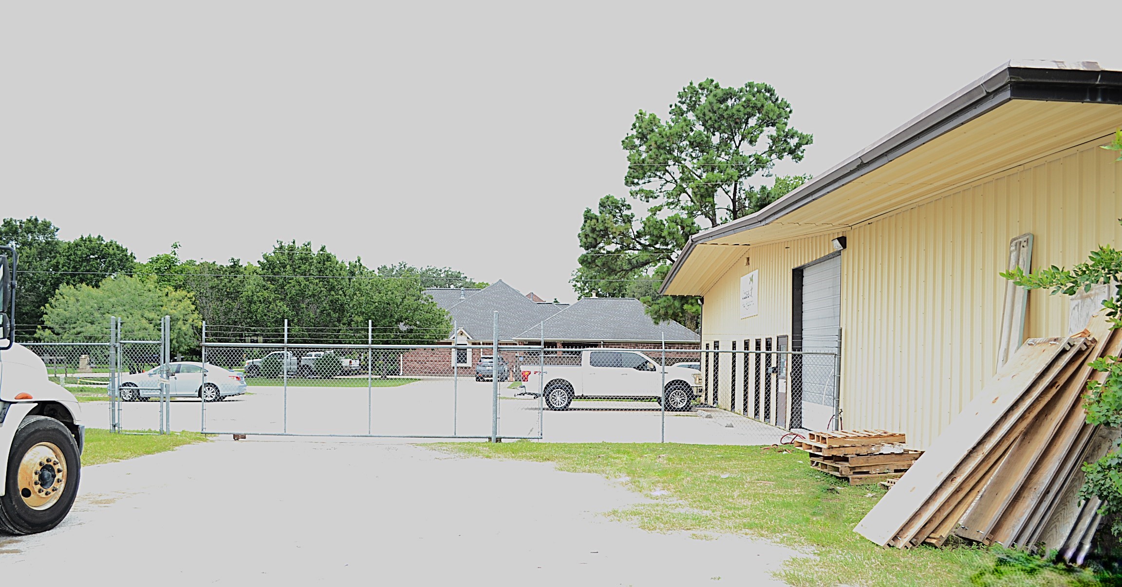 12122 Knigge Cemetery Road Cypress, TX 77429 - Photo 42 of 48 a view of a patio with a table and chairs with wooden fence