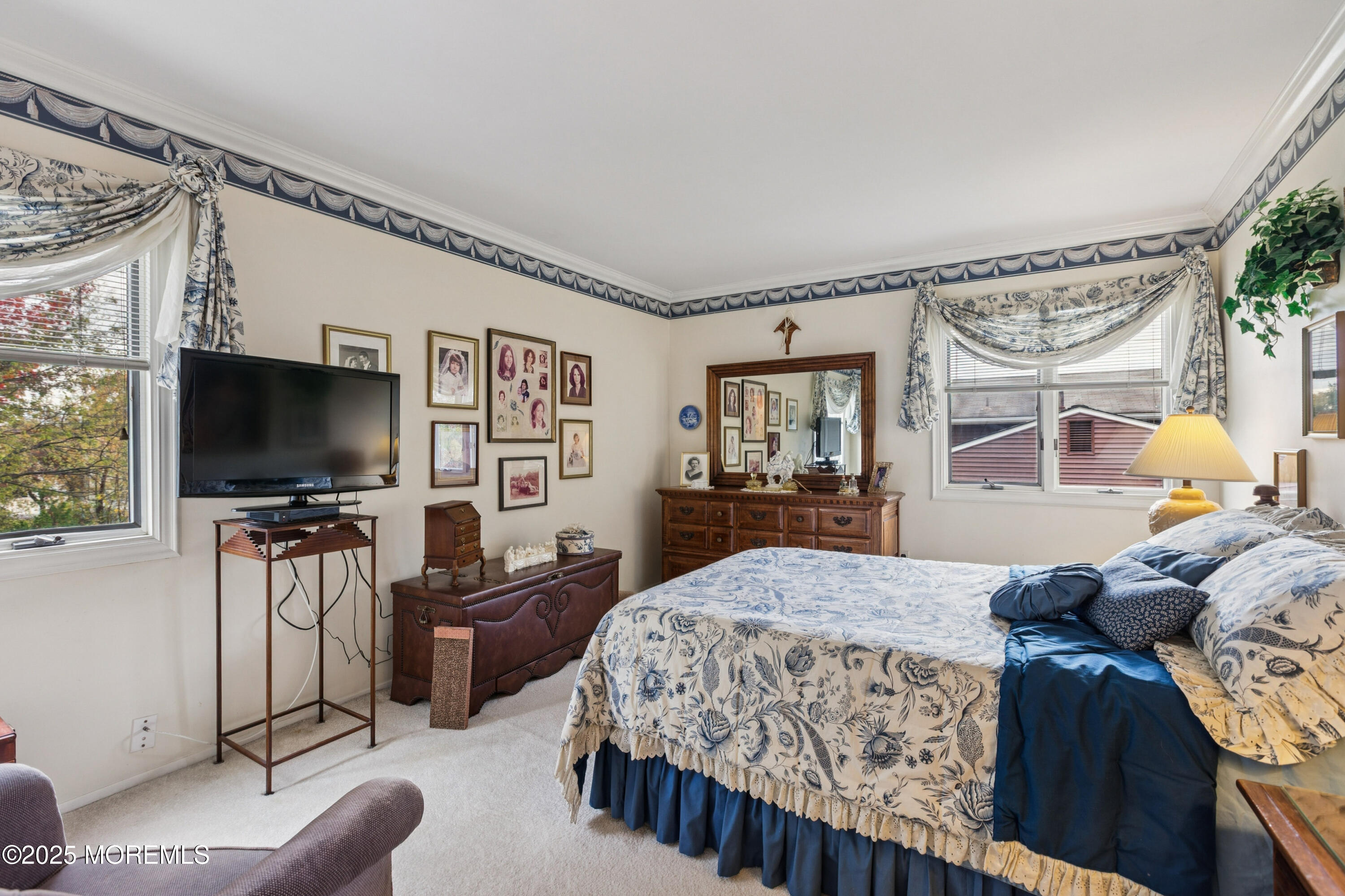 1 Hansen Road Old Bridge, NJ 08857 - Photo 17 of 25 a bedroom with a bed and a flat tv screen on dresser