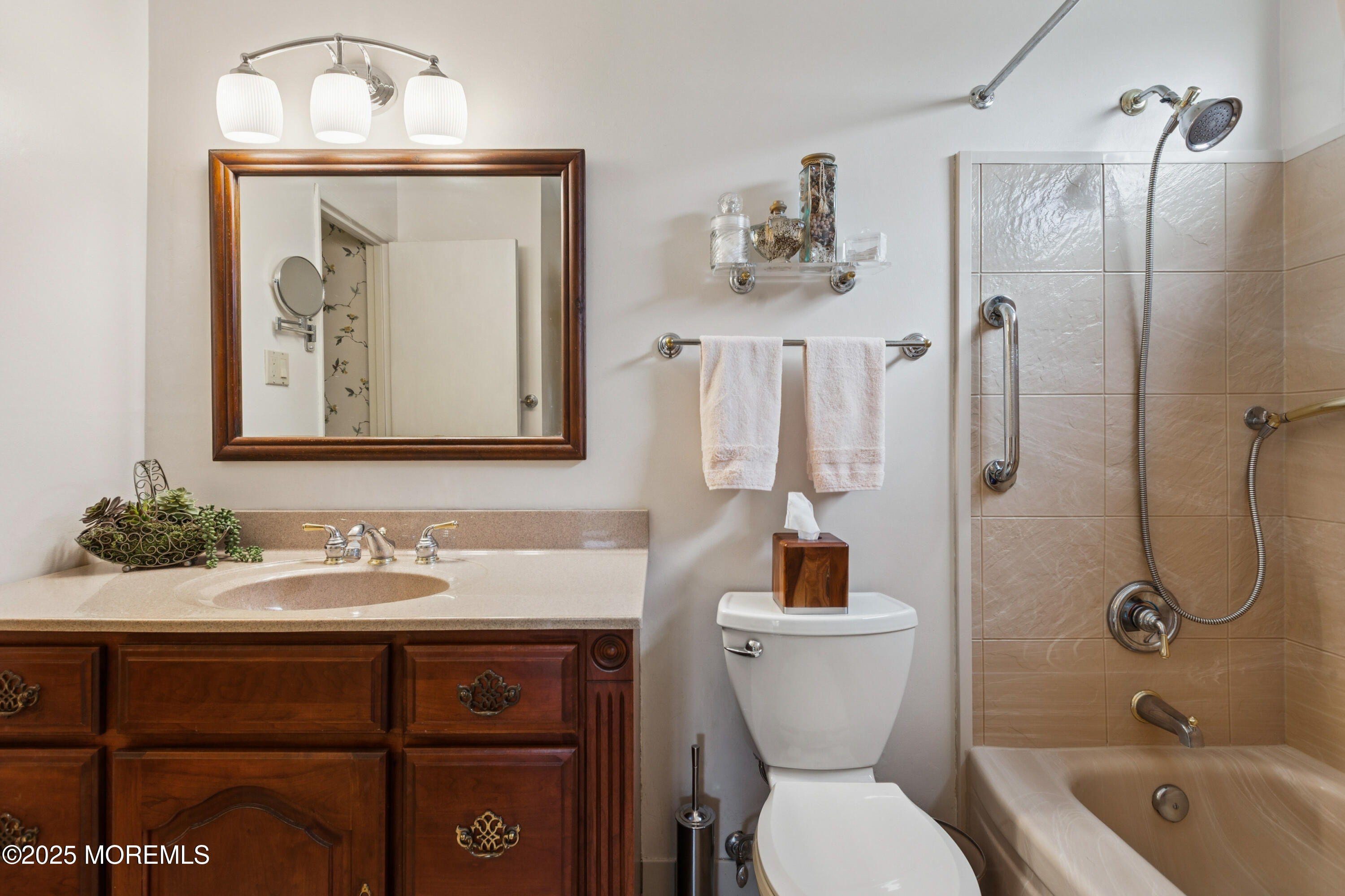 1 Hansen Road Old Bridge, NJ 08857 - Photo 20 of 25 a bathroom with a toilet a sink and mirror