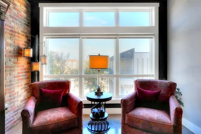 a living room with furniture and a window