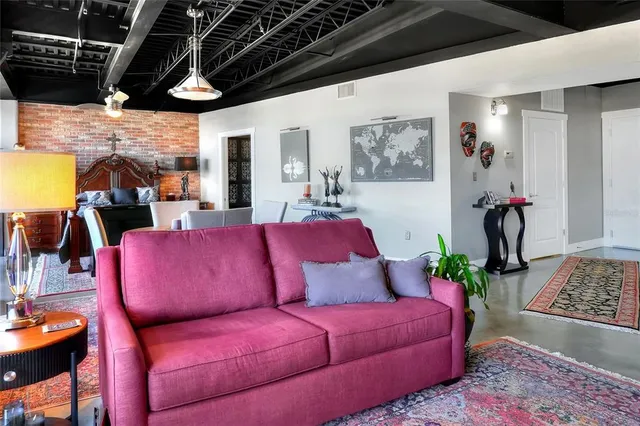 a media room with lots of chairs and a projector