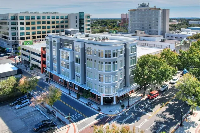 a large building with a bench