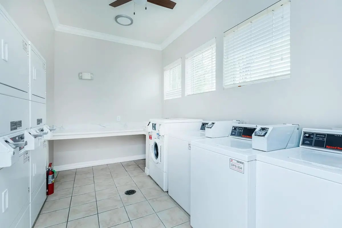 4101 Delafield Lane Dallas, TX 75227 - Photo 15 of 15 a utility room with dryer and washer