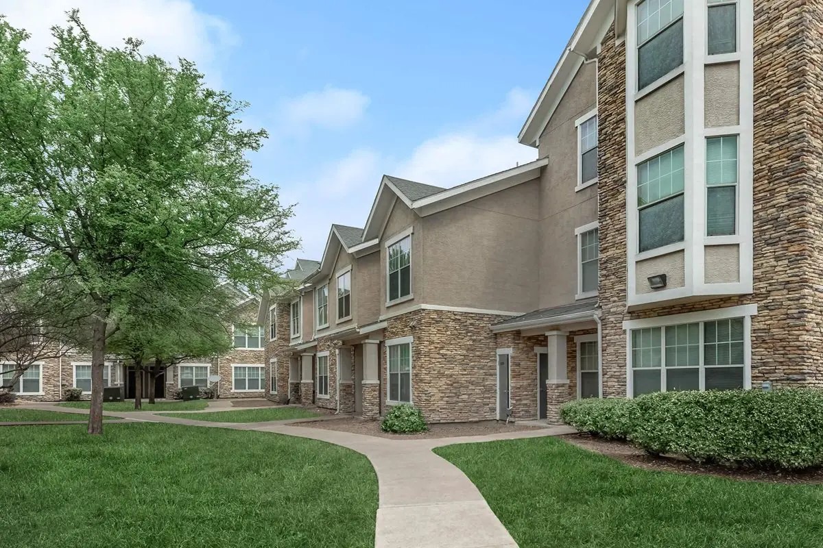 4101 Delafield Lane Dallas, TX 75227 - Photo 4 of 15 front view of a building with a yard