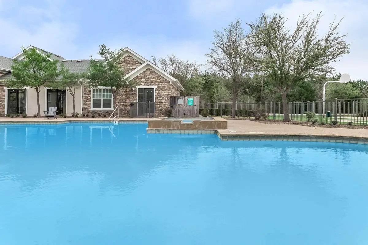4101 Delafield Lane Dallas, TX 75227 - Photo 7 of 15 a view of a house with pool and wooden fence