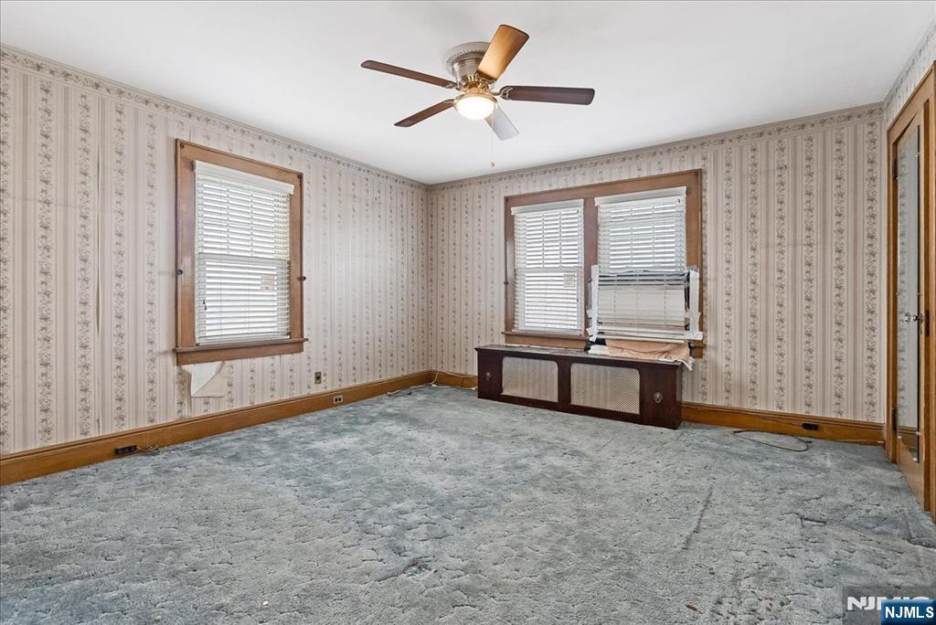 52 Manner Avenue Garfield, NJ 07026 - Photo 15 of 23 a living room with furniture and a window